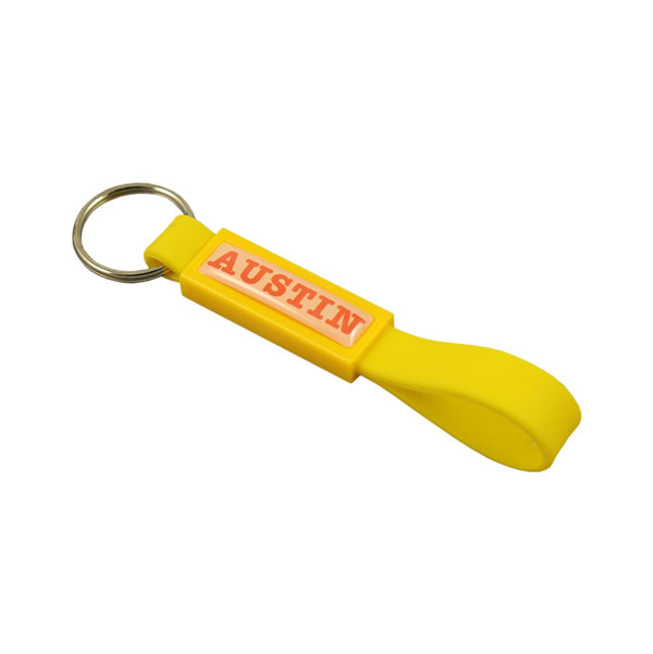 Silicon keychain with thin plastic patch