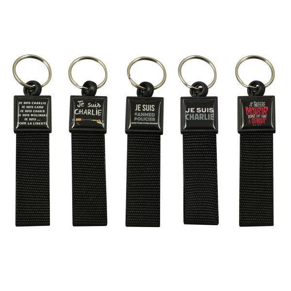 Plastic top keychain with webbing strap