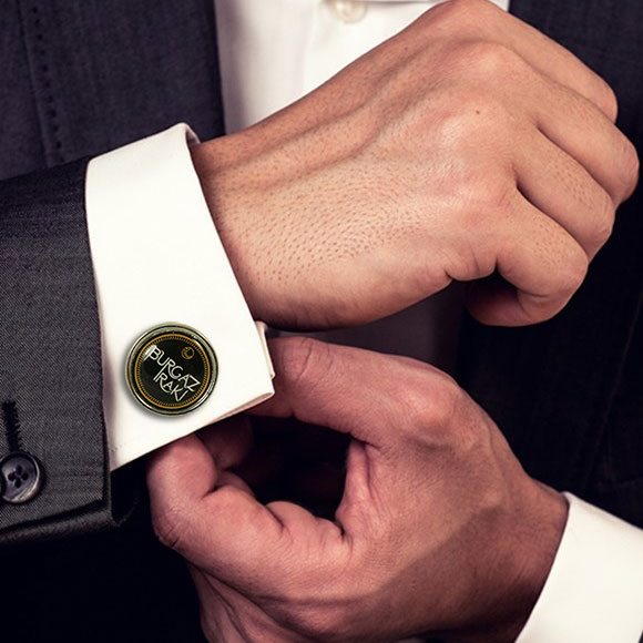 Metal cufflink with doming